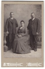 Photography studio Thurnheer, Berneck, three people in festive clothes