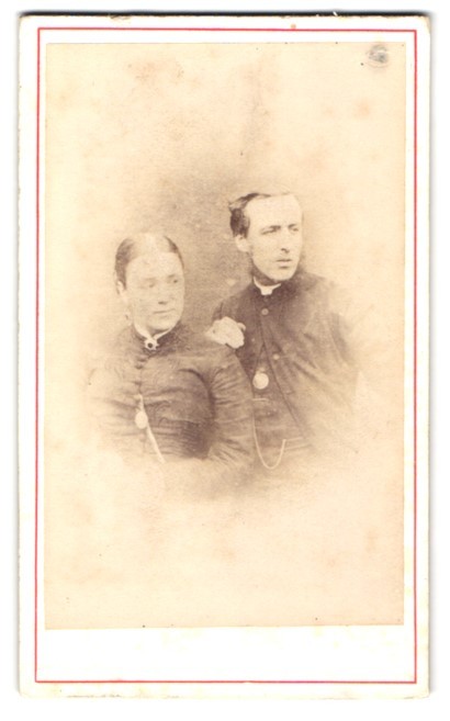 Photograph Two People In Traditional Clothes