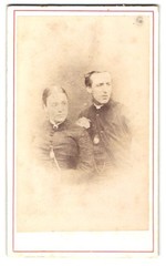 Photograph Two People In Traditional Clothes