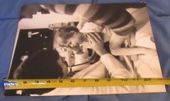1977 Sandy Underwood photograph; doctor examining child, 11″ x 14″