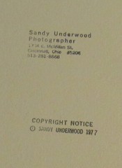 1977 Sandy Underwood photograph; man playing with child, 9 1/2″ x 14″