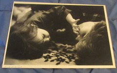 1977 Sandy Underwood photograph; child and woman on floor, 10″ x 14″